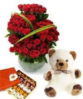 1/2 kg Mix Mithai and 24 red roses basket with 10 inches Teddy