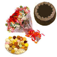 Half Kg Mix Barfi with 1/2 Kg Chocolate Cake and 12 Mix flowers bouquet