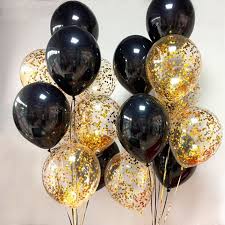 20 Golden black and confetti helium gas inflated birthday balloons tied with ribbons and roses