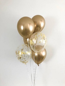 10 golden and confetti gas filled balloons tied with ribbons and roses