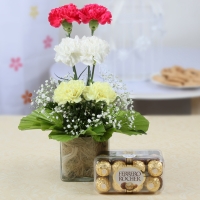 2 pink 2 White 2 yellow carnations basket with 16 Ferrero Chocolates box