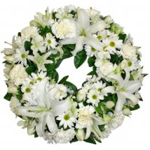 Wreath with white lilies and gerberas